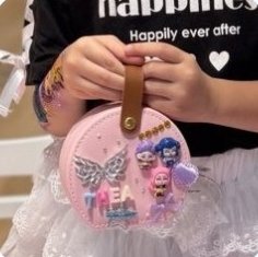 Decorated pink bag with charms