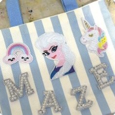 Striped tote bag with patches and pearl letters